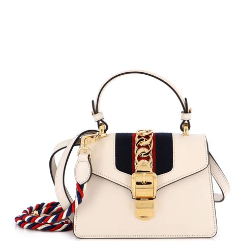 gucci sylvie huaren|Gucci White Leather Sylvie 1969 Top Handle Bag Small .